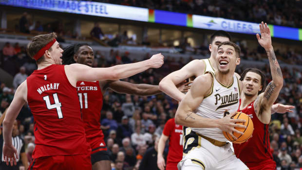 Mason Gillis (0) goes to the basket against the Rutgers Scarlet Knights.